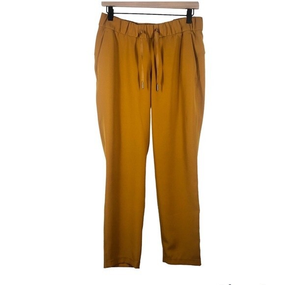 Lululemon On the Fly 7/8 Pant *Woven In Fools Gold Style W5BPMS Women’s Size 8 - Picture 1 of 9
